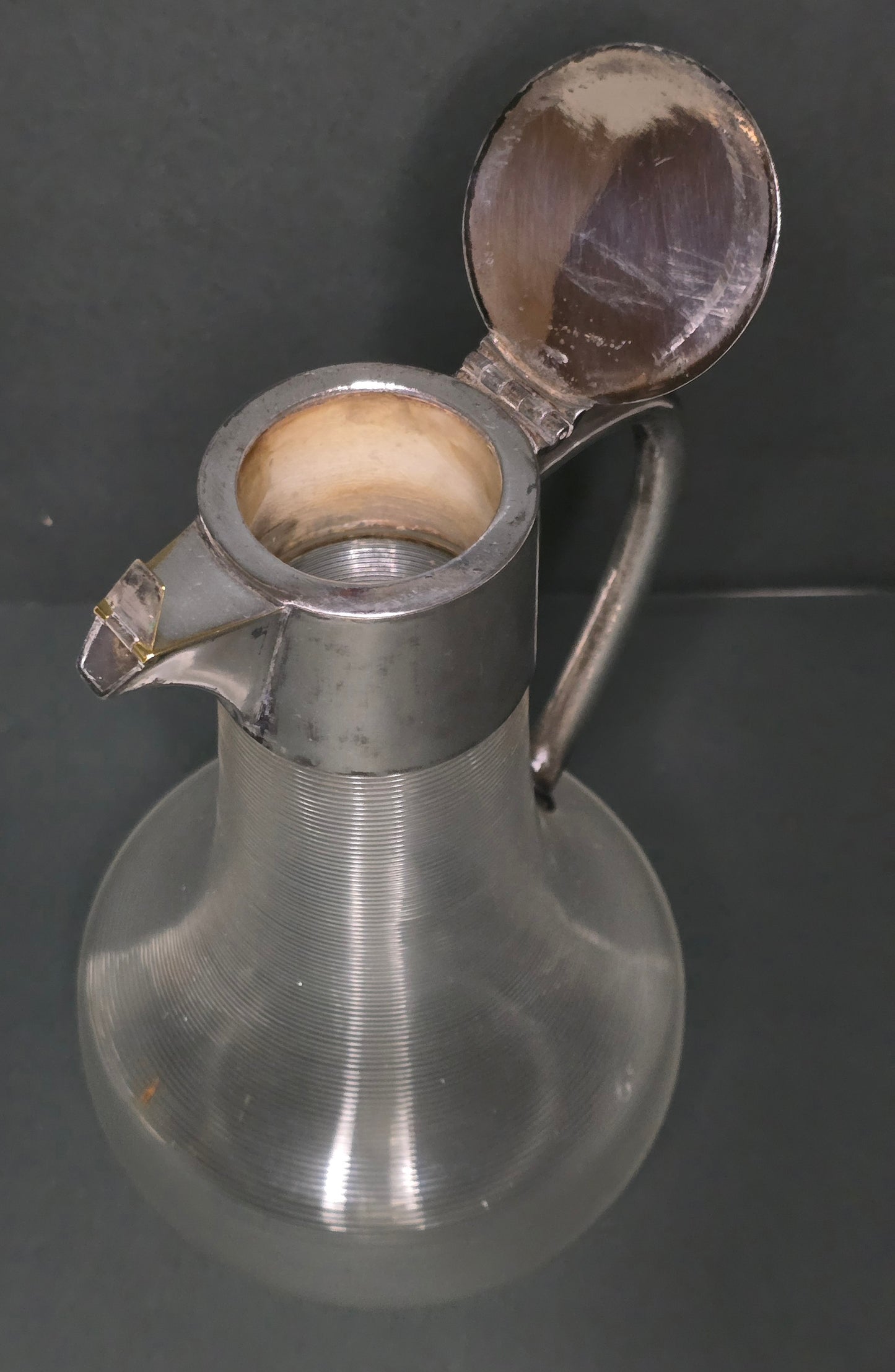 Mouth-blown Frisian thread glass carafe with silver-plated handle 1900