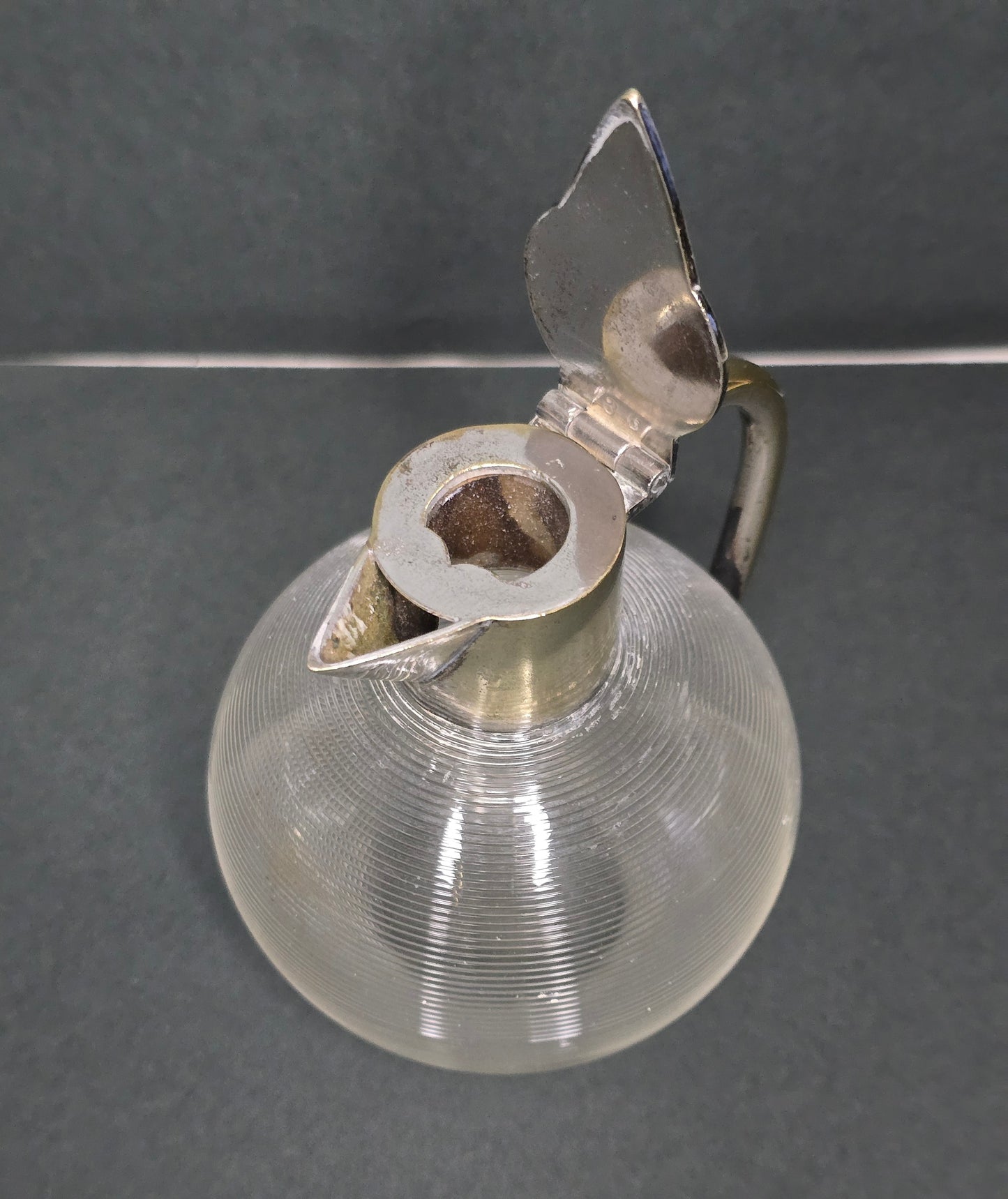 Mouth-blown Frisian thread glass jug with silver-plated handle 1910