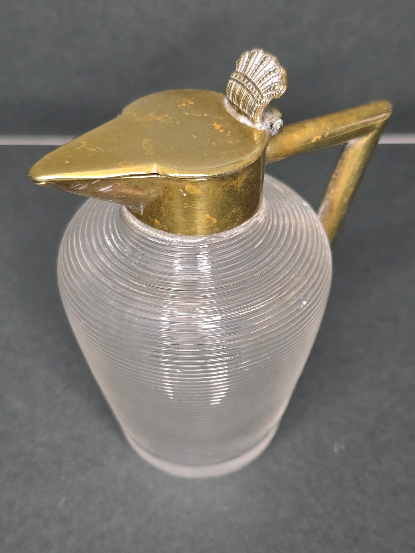 Mouth-blown Frisian thread glass milk jug with brass handle 1910