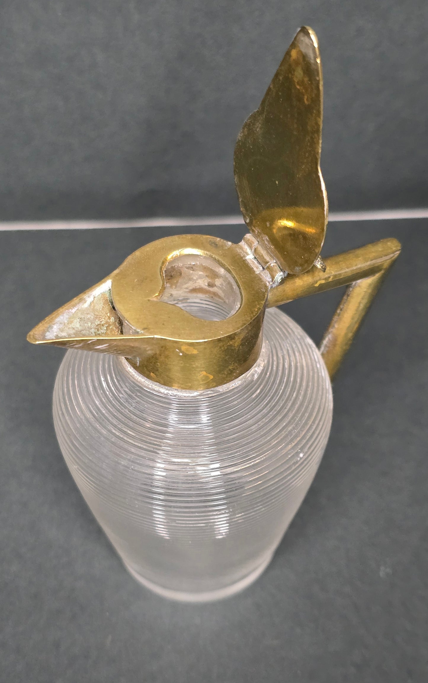 Mouth-blown Frisian thread glass milk jug with brass handle 1910