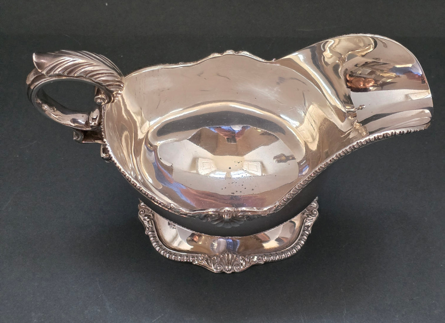 Antique Silver Sauce Boat on Pedestal with Dramatic Scroll Handle (circa 1840)