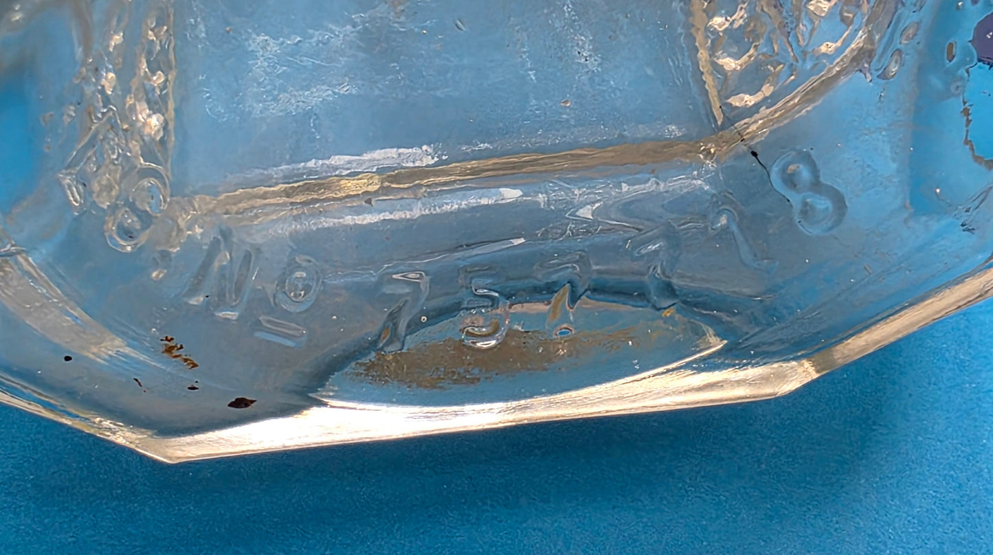 English pressed glass decanter c.1928 – fleur-de-lis pattern detail
