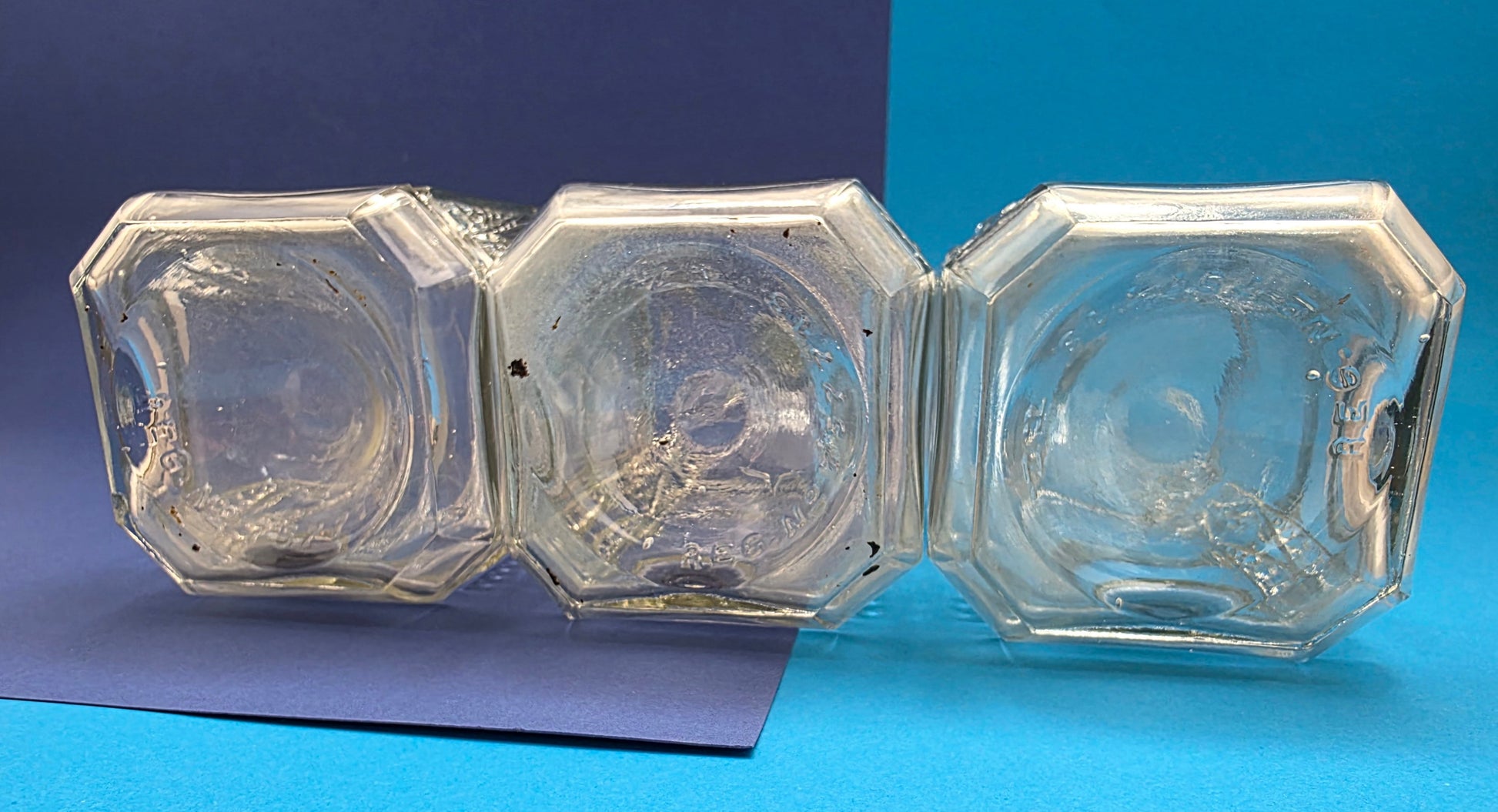 English pressed glass decanter c.1928 – stopper top view all three