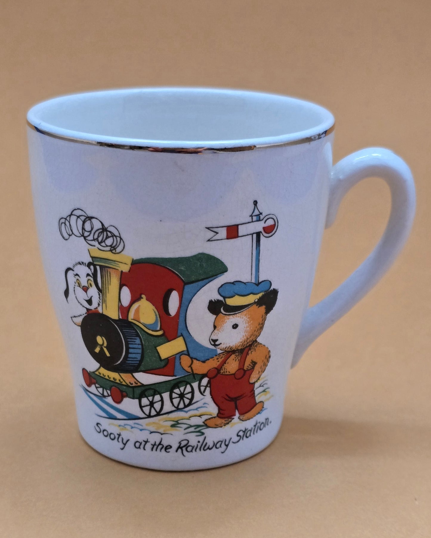 Sooty at the Railway Station – Vintage Keele Street Pottery Mug, c.1950s
